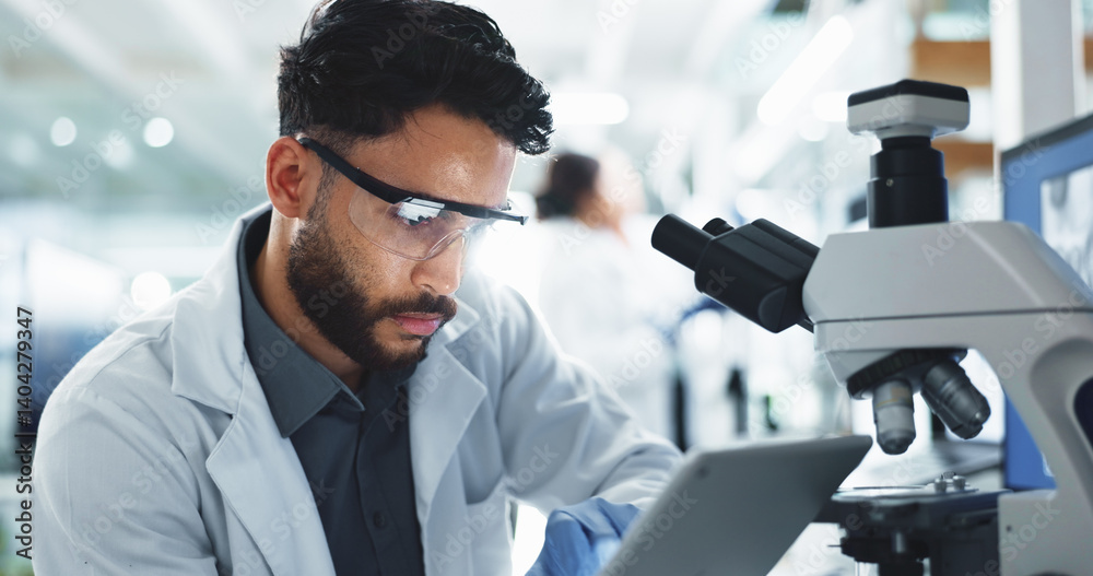Tablet, man and scientist with microscope in laboratory for online research with DNA for medical innovation. Biotechnology, goggles and male biologist with RNA for pharmaceutical study or discovery.