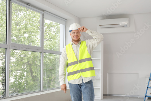 Male contractor with safety...