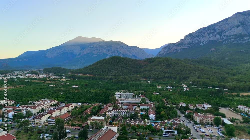 Valley town with mountains at sunrise, Antalya, Turkey 10.20.2024 Valley town with mountains at sunrise, Antalya, Turkey 10.20.2024