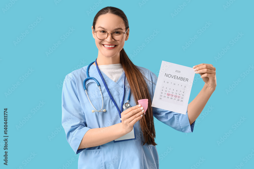 Female doctor with menstrual calendar and cup on blue background Female doctor with menstrual calendar and cup on blue background