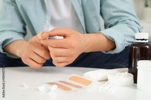 Young man applying medical ...
