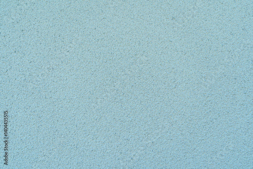 Cement wall blue color is used as background