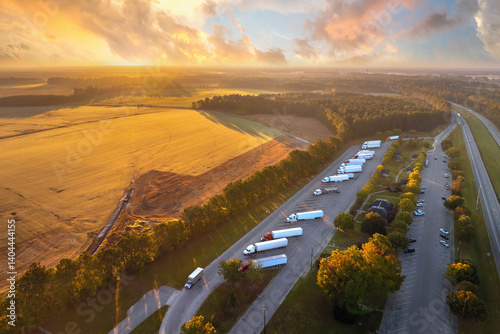 Rest area for semi trucks near busy interstate freeway. Truck stop place during hauling cargo