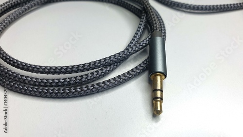 Vászonkép Close-up of a braided grey audio cable with a 3