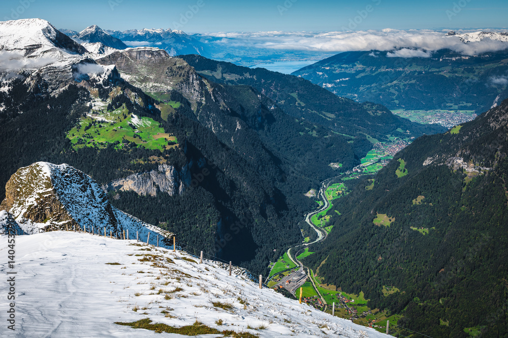 Green fields and snowy slopes near Grindelwald, Switzerland