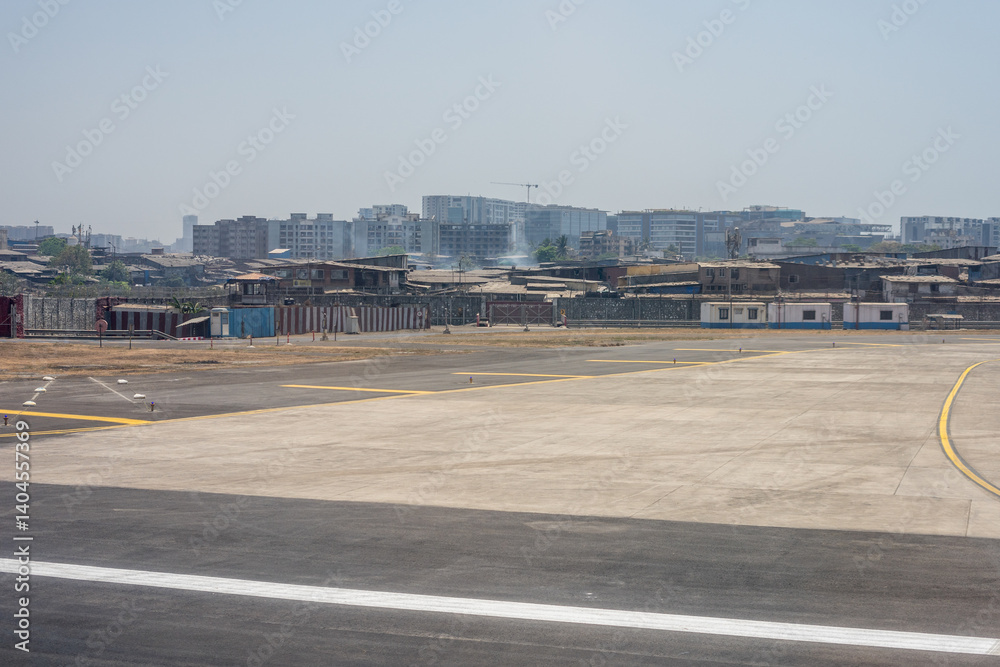 India, Maharashtra, Mumbai, a view of a city skyline dharavi slum and tall buildings