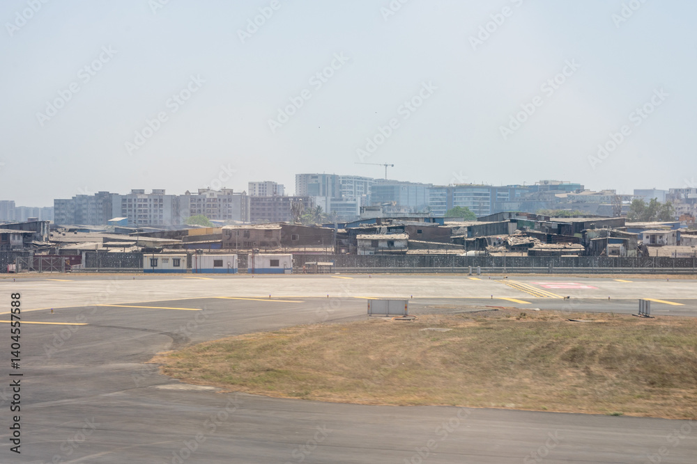 India, Maharashtra, Mumbai, a view of a city skyline dharavi slum and tall buildings