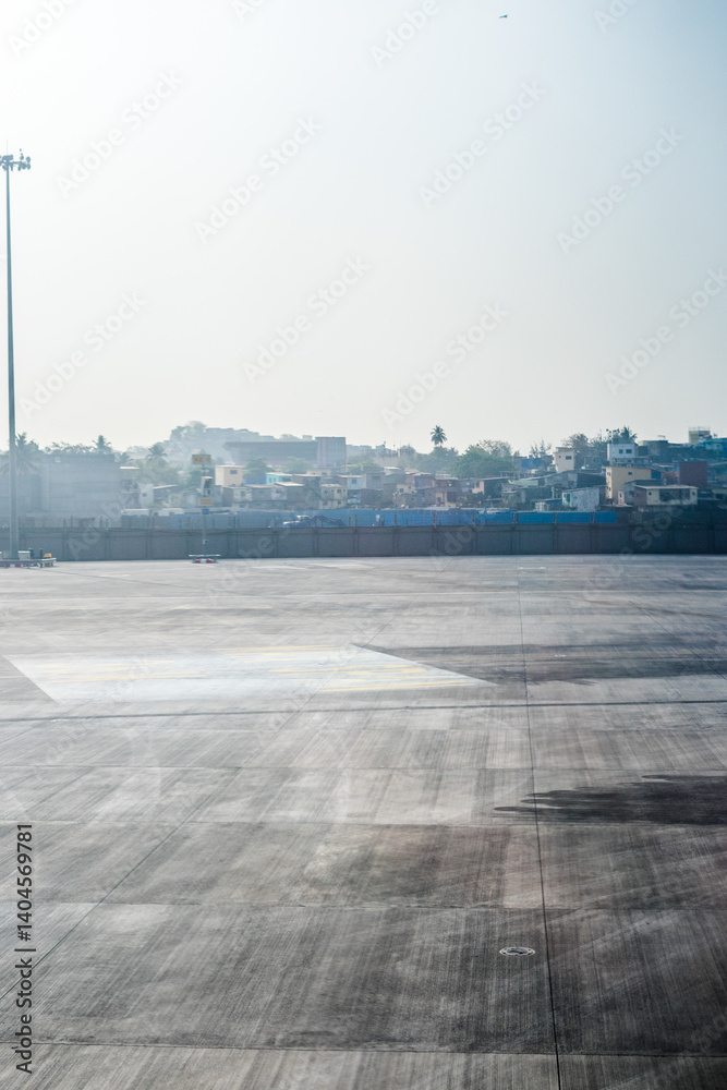 India, Maharashtra, Mumbai, a hazy view of the city slum viewed from the airport