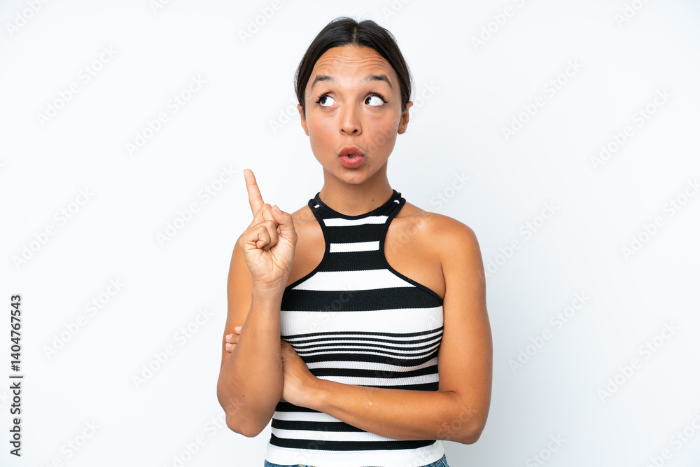 Young hispanic woman isolated on white background thinking an idea pointing the finger up Young hispanic woman isolated on white background thinking an idea pointing the finger up