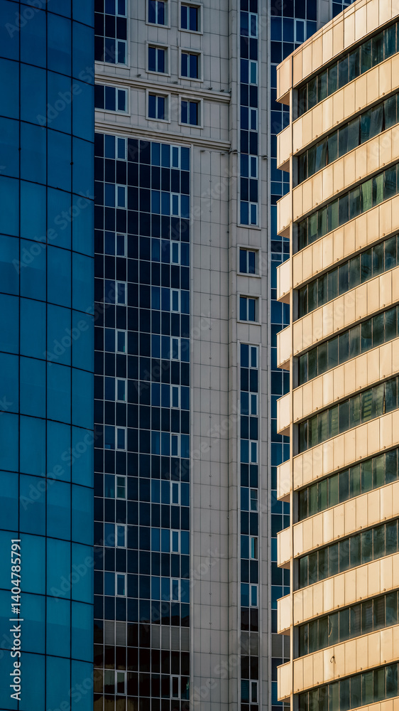 many windows and walls facade of a modern skyscraper without people many windows and walls facade of a modern skyscraper without people