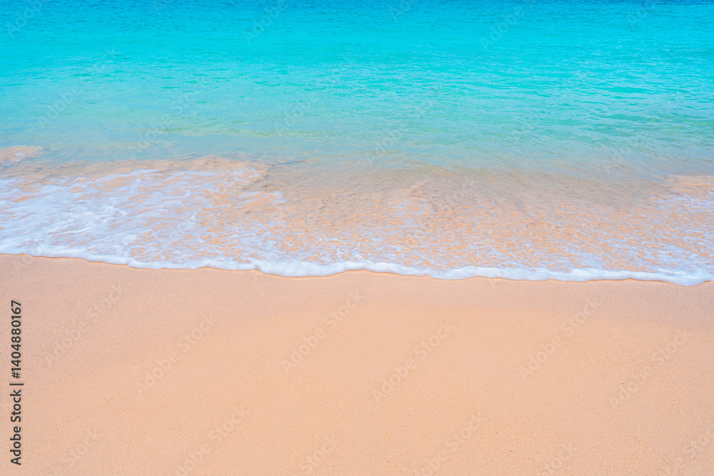 Turquoise waters lap a white sandy beach under a brilliant sun summer at its finest. Turquoise waters lap a white sandy beach under a brilliant sun summer at its finest.