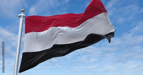 Yemen flag with flagpole waving in wind, rolling clouds background looping, 4K video (Perfect Loop)