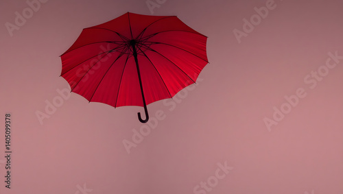 Crimson Umbrella Minimalist Photography A Red Umbrella Suspended in a Simple Background