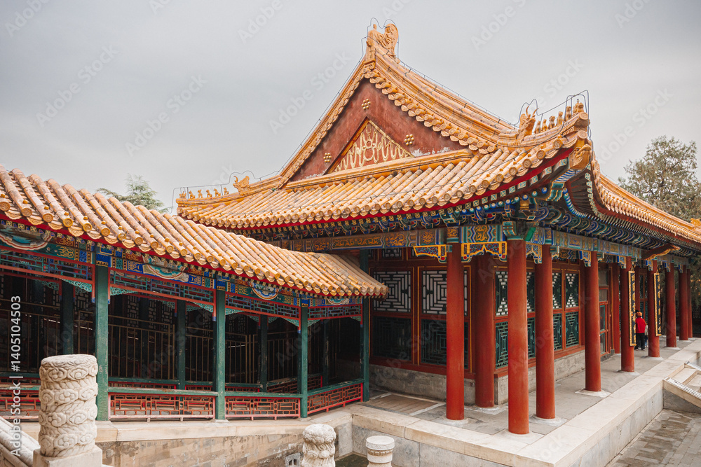 There is a beautiful Chinese building located with a serene pond situated in front of it, enhancing its picturesque appeal and charm There is a beautiful Chinese building located with a serene pond situated in front of it, enhancing its picturesque appeal and charm