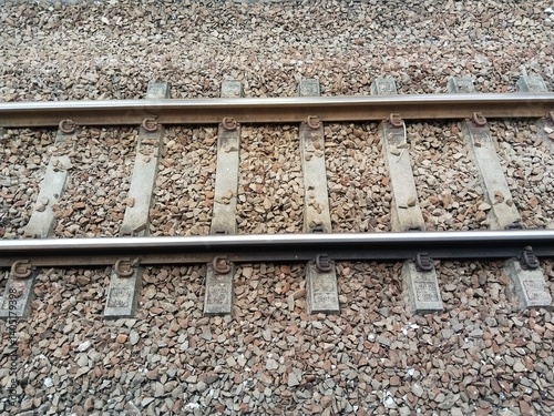 Close-Up View of Railway Tracks and Gravel in Indonesia