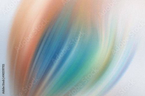 Abstract blurred image showing a blend of colors including blue orange and white on a light background