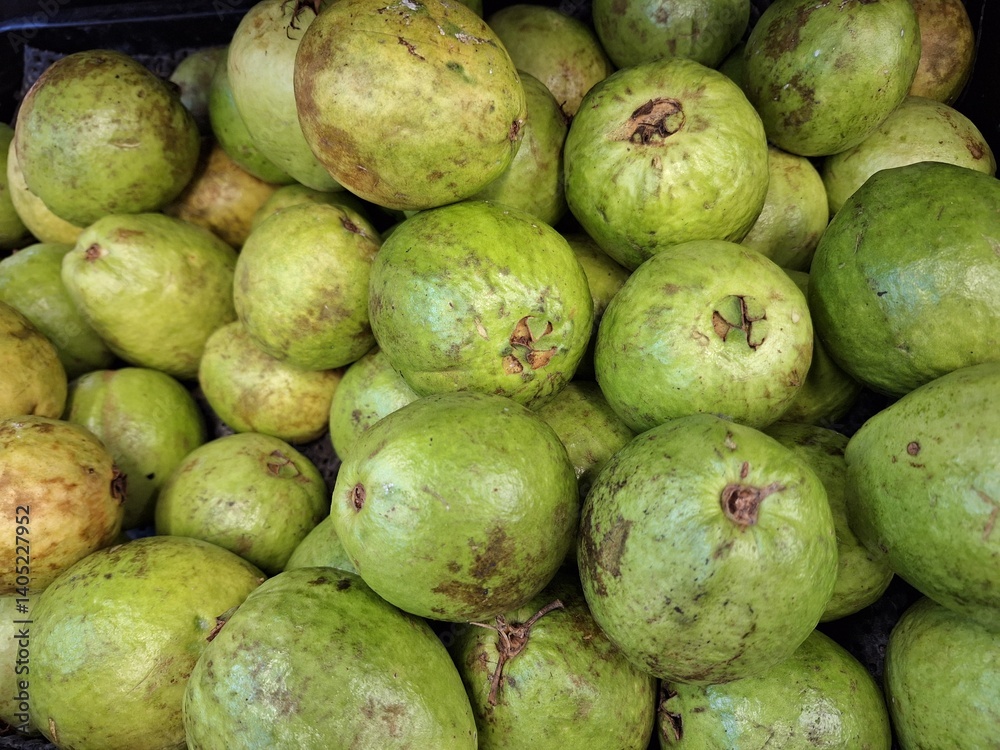 Pile of Mottled Green Guavas: Fresh, Tropical Harvest. Pile of Mottled Green Guavas: Fresh, Tropical Harvest.