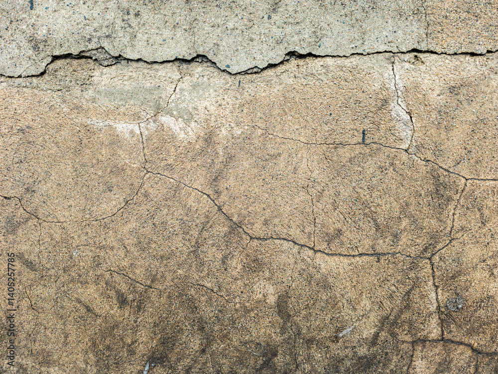 Obraz premium Cracked plaster wall texture, aged surface, grunge background, damaged stucco, weathered material