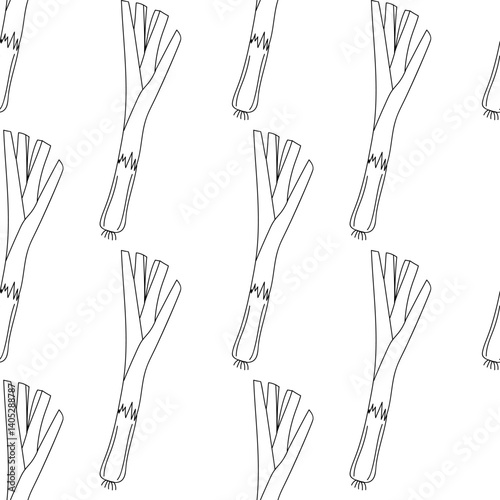 Leeks arranged in a repeating pattern on a white background for decorative or culinary use