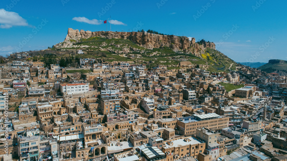 Fototapeta premium Mardin old town. Ancient and stone houses of Old Mardin. Mardin castle and city center. Turkiye.