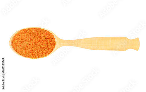 Dried paprika seasoning in a spoon