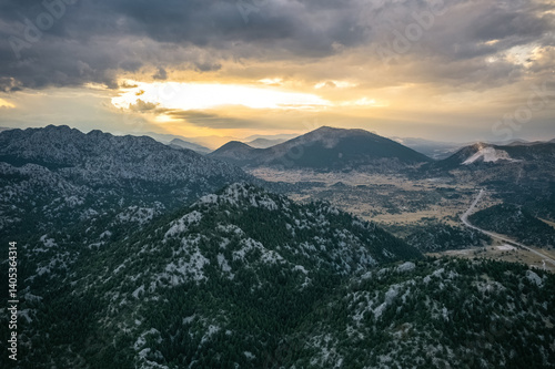 Large, impressive mountains covered with trees in the Akseki district of Antalya. Cloudy skies and unique natural scenery. Antalya, Turkey.