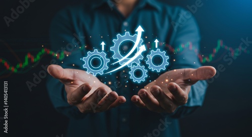 Hands holding a holographic display of interconnected gears and upward-pointing arrows, symbolizing growth, efficiency, and business process optimization
