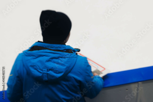 Hockey match game on ice rink arena stadium, team of ice hockey professional players with coach, stick and puck, team of hockey players in protective sport uniform training, hockey league championship photo