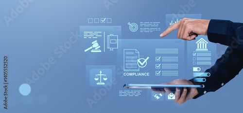 Photography Businessman interacting with compliance and legal regulation icons on digital screen with futuristic creative background in blue tone