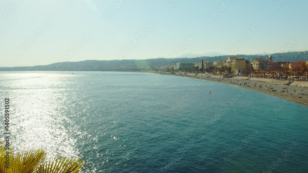 4K Nice, France French Riviera view of the beautiful Baie des Anges from Rauba Capeu quay with pan across the entire coastline slow motion