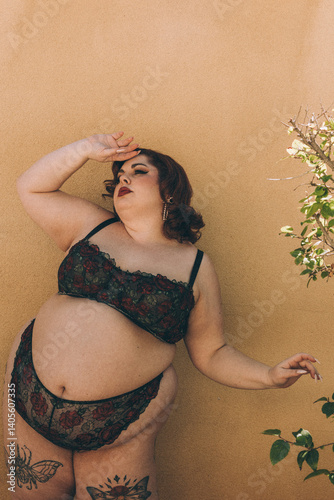 Plus size old Hollywood lingerie model outdoors