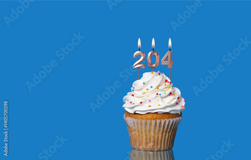Birthday Or Anniversary Cupcake With Lit Candles; Candles Forming The Number 204.