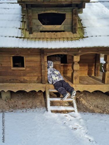 Tiny dwarf village hidden in the forest. Snow covered elf houses. Whimsical travel place. Kid exploring gnome house.