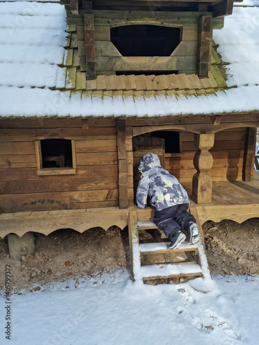 Tiny dwarf village hidden in the forest. Snow covered elf houses. Whimsical travel place. Kid exploring gnome house.