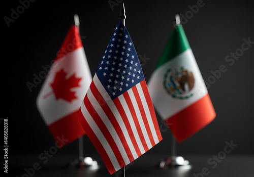 The flags of Canada, the United States, and Mexico stand together in an international display.