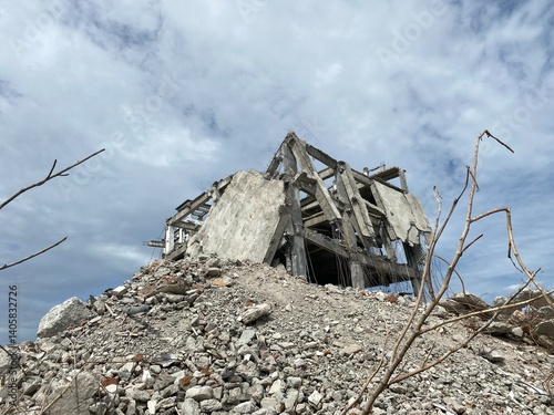 Damaged building stands amid rubble after the devastating earthquake in Palu, Central Sulawesi, Indonesia, on September 28, 2018. photo