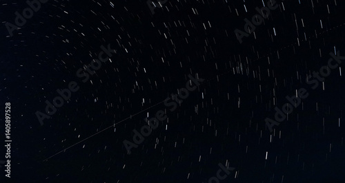Obraz na płótnie Star Trails and Airplane Trail in the Night Sky w salonie