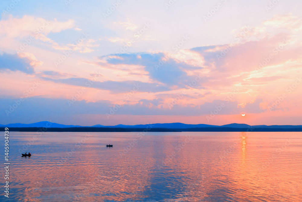 Sea landscape. Summer sunny sea scene with unidentified people in the boat, concept of summer sea vacation activities Sea landscape. Summer sunny sea scene with unidentified people in the boat, concept of summer sea vacation activities