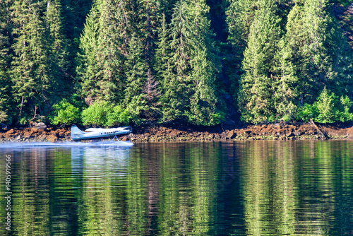 Sea Plane Landing on the Waters of Misty Fjord, Alaska photo