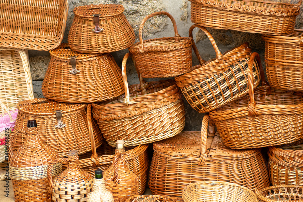 Handmade wicker baskets displayed for sale at a traditional festival in Galicia, Spain Handmade wicker baskets displayed for sale at a traditional festival in Galicia, Spain