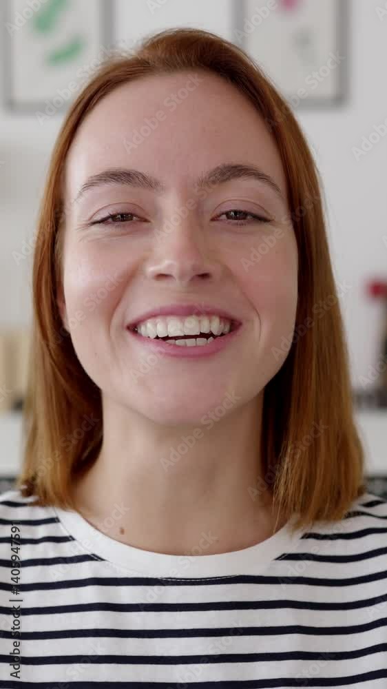 Vertical HD video. POV woman talking with colleague on laptop video call from living room. Pretty millennial female having a conversation through online meeting. Technology lifestyle concept Vertical HD video. POV woman talking with colleague on laptop video call from living room. Pretty millennial female having a conversation through online meeting. Technology lifestyle concept