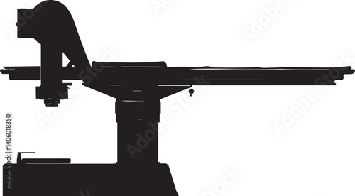 Silhouette of a modern industrial machinery with robotic arm for precision tasks and automation.