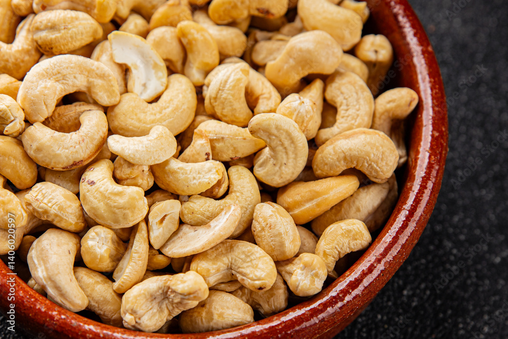 Cashew nuts natural superfood natural food dish organic product fresh tasty gourmet food background on the table rustic food top view copy space keto and paleo diet vegetarian vegan food Cashew nuts natural superfood natural food dish organic product fresh tasty gourmet food background on the table rustic food top view copy space keto and paleo diet vegetarian vegan food