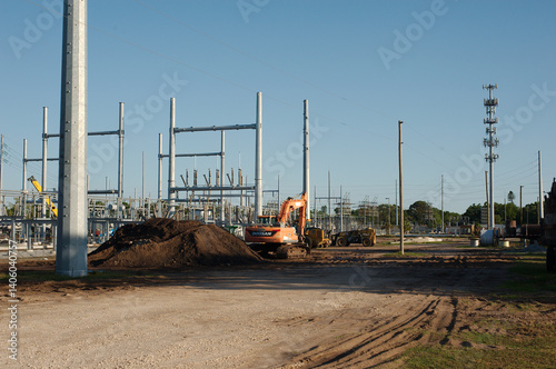 Substation Construction Site Featuring Industrial Infrastructure and Extensive Modern Equipment. Utility setups in progress. Part of an electrical grid. Captures the essence of modern engineering and 