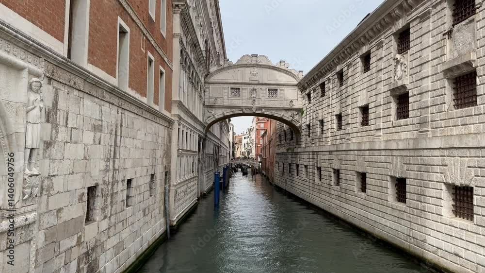 This video showcases the iconic Bridge of Sighs in Venice, Italy, capturing its architectural beauty and the surrounding canal. A glimpse into Venetian history and culture. This video showcases the iconic Bridge of Sighs in Venice, Italy, capturing its architectural beauty and the surrounding canal. A glimpse into Venetian history and culture.