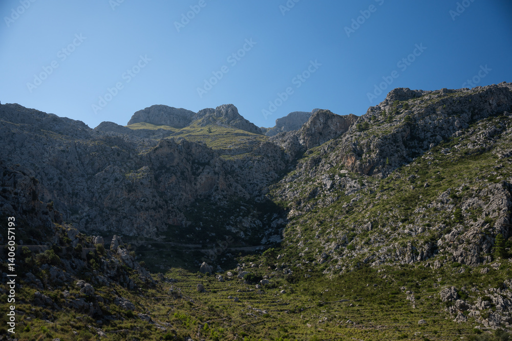 The Serra de Tramuntana is a mountain range, which forms the northern backbone of the Spanish island of Mallorca The Serra de Tramuntana is a mountain range, which forms the northern backbone of the Spanish island of Mallorca