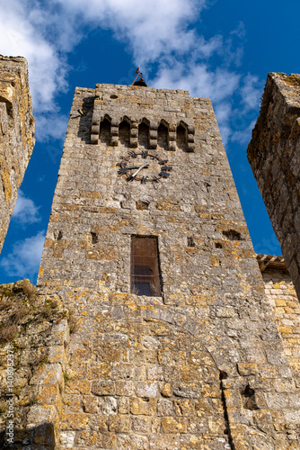 The entrance tower of the fortified city of Larressingle, France photo