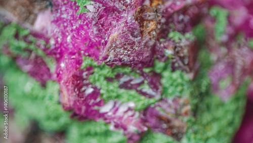 Cobaltocalcite with Kolwezite (green structural type of malachite) on matrix. Kolwezi, Lualaba, DR Congo. High magnification microscopy, scale of 10X