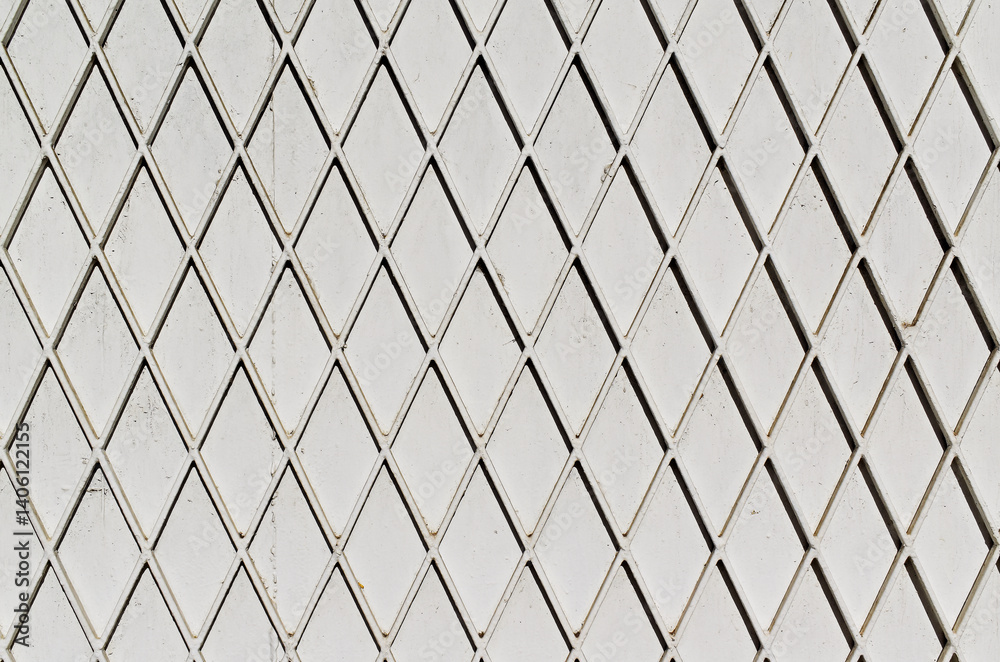 Grid on white metal surface in Tijuca district, Rio, Brazil
