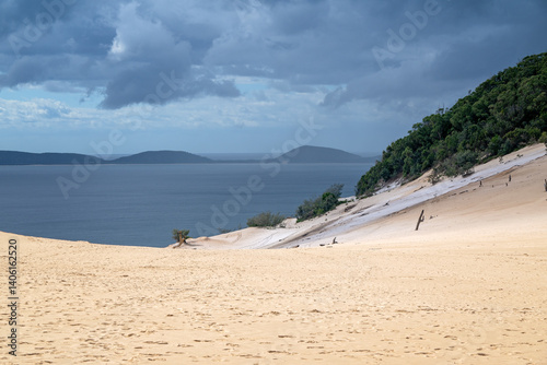 Fototapeta Naklejka Na Ścianę i Meble -  Carlo sand blow, view to Fraser Island, K'gari, Rainbow Beach, Queensland, Australia, tropical holiday vacation destination, sand dune 